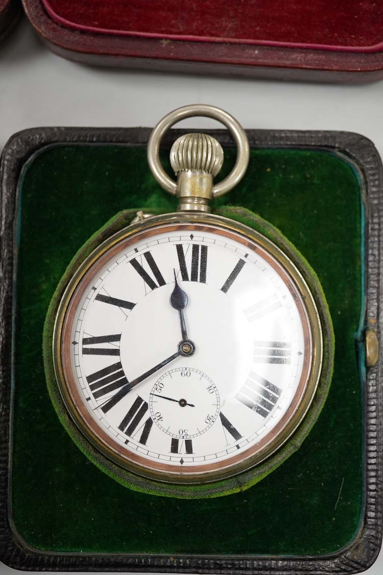 Two Edwardian silver mounted leather travelling watch cases, Chester 1905 and Birmingham, 1907, both containing a chrome cased keyless pocket watch.